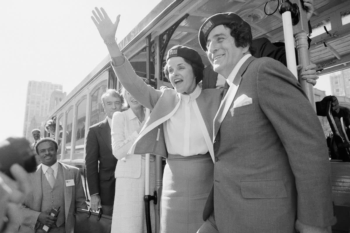 Dianne Feinstein and Tony Bennett at a San Francisco cable car in 1984 (Copyright 2020 The Associated Press. All rights reserved.)