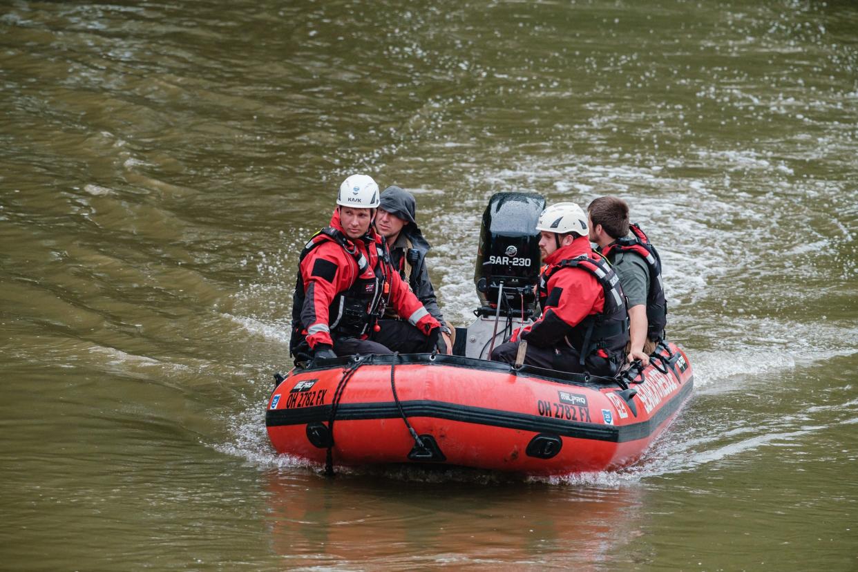 Rescue personnel continue to search the Tuscarawas River from Port Washington to Gnadenhutten for a 25-year-old man, Monday, June 6 in Tuscarawas County. The man went missing early Saturday morning after his canoe capsized. His 27-year-old friend was able to swim ashore and call 911.