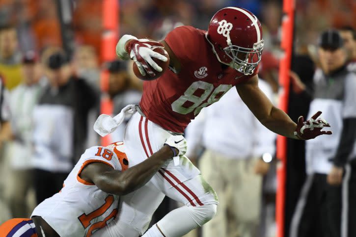 Jan 9, 2017; Tampa, FL, USA; Alabama Crimson Tide tight end O.J. Howard (88) runs the ball while guarded by Clemson Tigers safety Jadar Johnson (18) during the fourth quarter in the 2017 College Football Playoff National Championship Game at Raymond James Stadium. Mandatory Credit: John David Mercer-USA TODAY