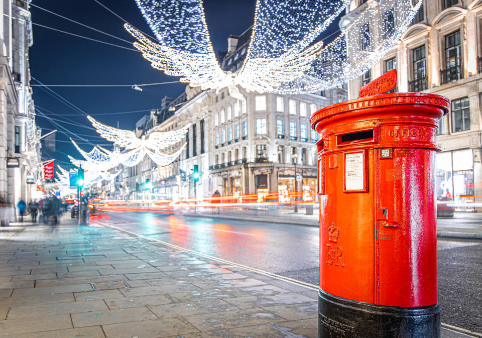 Red mail box on Regent street in London, UK christmas