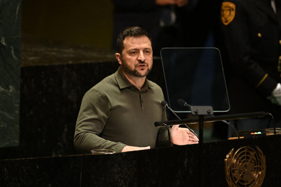 Zelensky stands at a podium at the U.N.