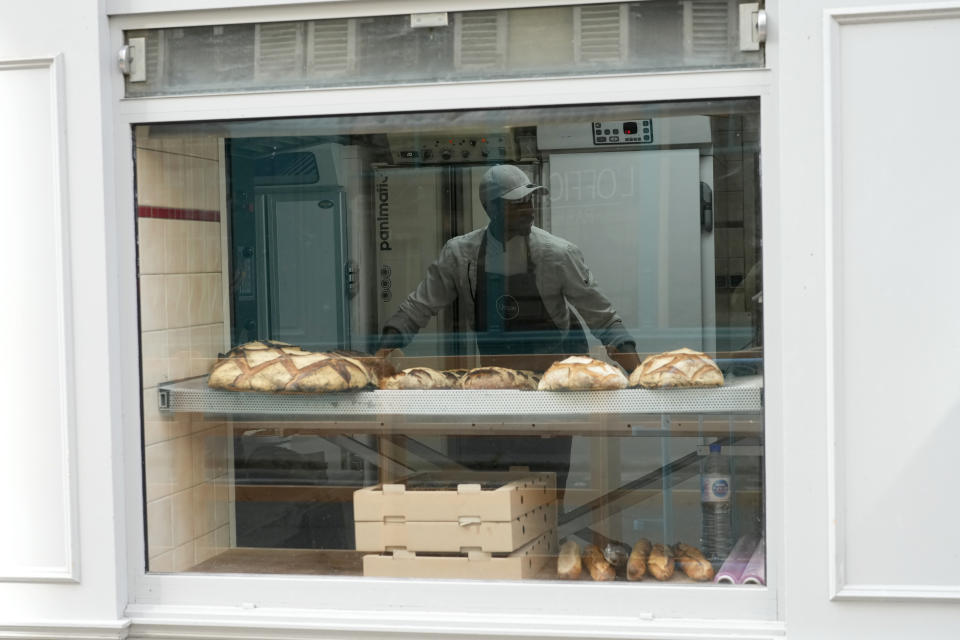 Baker Xavier Netry works at the Utopie bakery Friday, April 26, 2024 in Paris. Baker Xavier Netry was chosen this week as the 31st winner of Paris' annual "Grand Prix de la baguette" prize. The Utopie bakery in Paris' 11th district that Netry works for wins 4,000 euros ($4,290) and becomes one of the suppliers of the presidential Elysee Palace for a year. (AP Photo/Thibault Camus)