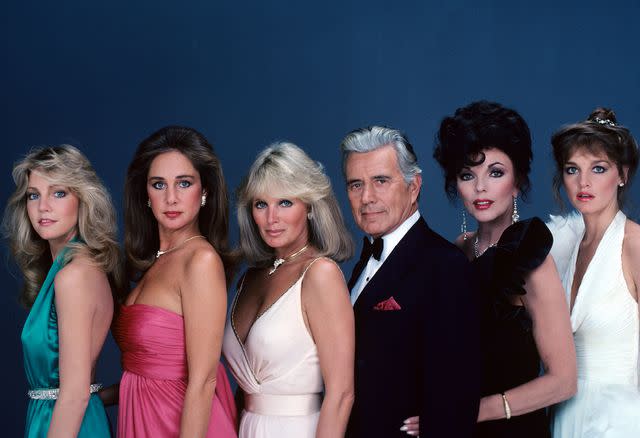 <p>ABC Photo Archives/Disney General Entertainment Content/Getty</p> Heather Locklear, Pamela Bellwood, Linda Evans, John Forsythe, Joan Collins, and Pamela Sue Martin in 'Dynasty'.