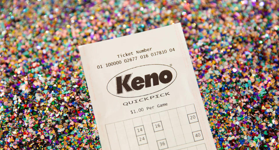 Keno quickpick ticket on sparkly background. 