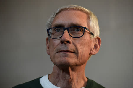 FILE PHOTO: Then-Democratic gubernatorial candidate Tony Evers waits to speak to supporters at a campaign event in Milwaukee, Wisconsin, U.S. November 4, 2018. REUTERS/Nick Oxford/File Photo