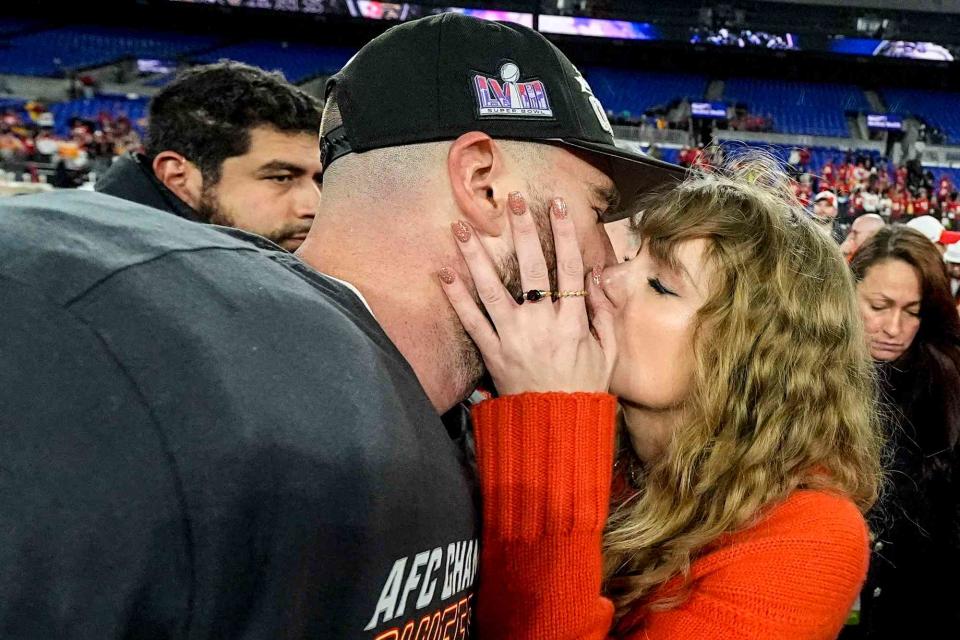 <p>AP Photo/Julio Cortez</p> Taylor Swift kisses Kansas City Chiefs tight end Travis Kelce after an AFC Championship NFL football game against the Baltimore Ravens, Sunday, Jan. 28, 2024