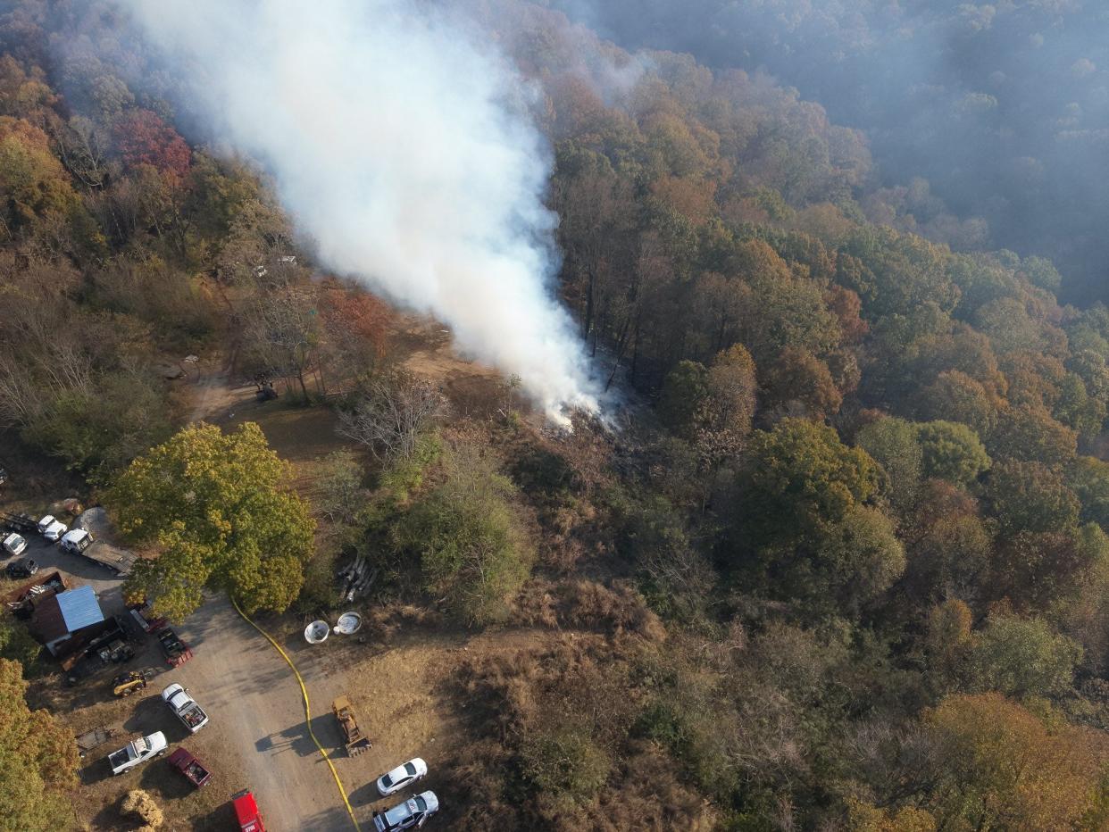 Nashville firefighters are fighting a bushfire on Gourley Road near the Cheatham and Davidson County line that started late Saturday night. No injuries have been reported.