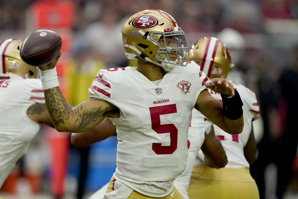 San Francisco 49ers quarterback Trey Lance (5) throws against the Arizona Cardinals during the first half of an NFL football game, Sunday, Oct. 10, 2021, in Glendale, Ariz. (AP Photo/Darryl Webb)