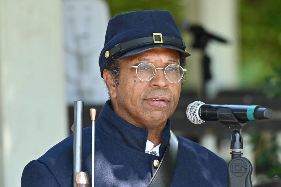 Lonnie Davis speaks during the 32nd Juneteenth Freedom Festival on Saturday, June 15, 2024, at Tattnall Square Park in Macon, Georgia. Davis does living history presentation on the Georgia African Brigade, three Black Union regiments that organized in Macon during the Civil War.
