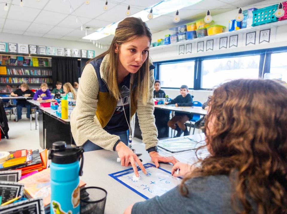 Drea Leach teaches her fifth grade students about fractions at Valley View.