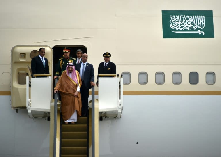 Saudi Arabia's King Salman (front) is accompanied by about 1,000 people and 460 tons of equipment as he visits Indonesia