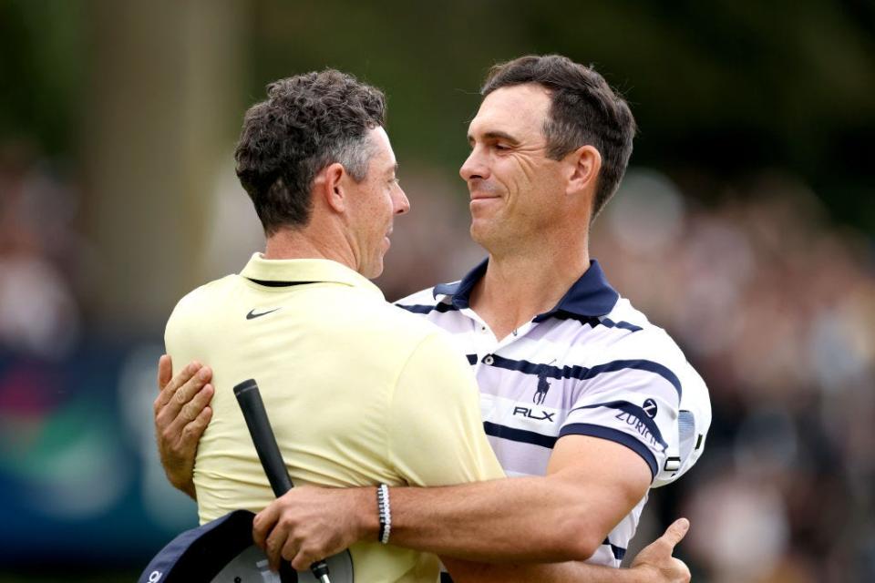 Billy Horschel (right) of Ponte Vedra Beach accepts the congratulations of Rory McIlroy after Horschel won the DP World Tour's BMW PGA Championship on Sept. 22 at Wentworth, in Virginia Water, England.