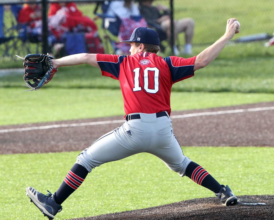 Bedford North Lawrence's Isaac Daria (10) hurls a pitch.