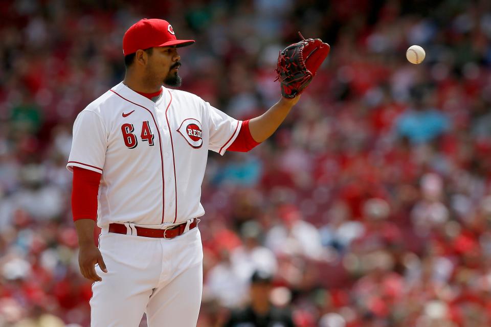 Cincinnati Reds starting pitcher Tony Santillan (64) enters the game in the sixth inning of the MLB National League game between the Cincinnati Reds and the St. Louis Cardinals at Great American Ball Park in downtown Cincinnati on Sunday, April 24, 2022. The Reds broke an 11-game losing streak with a 4-1 win over the Cardinals. 