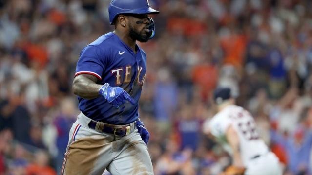 Rangers vs. Astros: Adolis Garcia responds to benches-clearing brawl with  grand slam in ALCS Game 6 - DraftKings Network