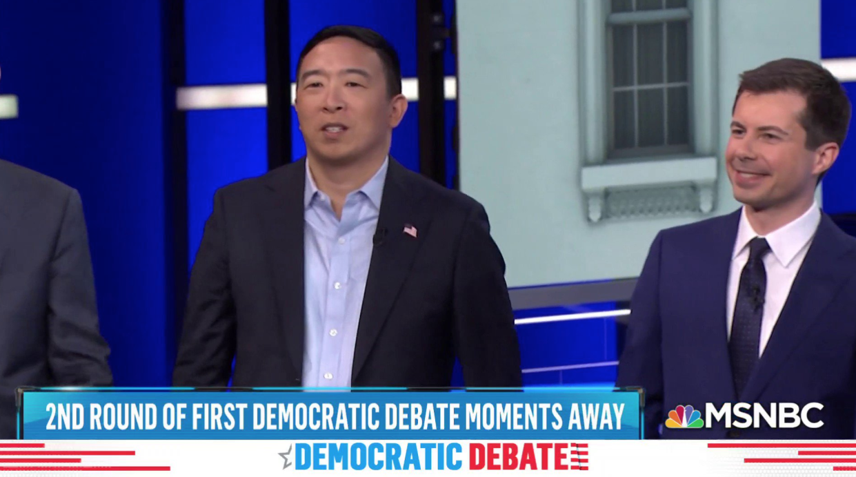 Andrew Yang raised eyebrows when he opted out of wearing a tie during the second night of the Democratic Debates on June 27. (Photo: MSNBC) 