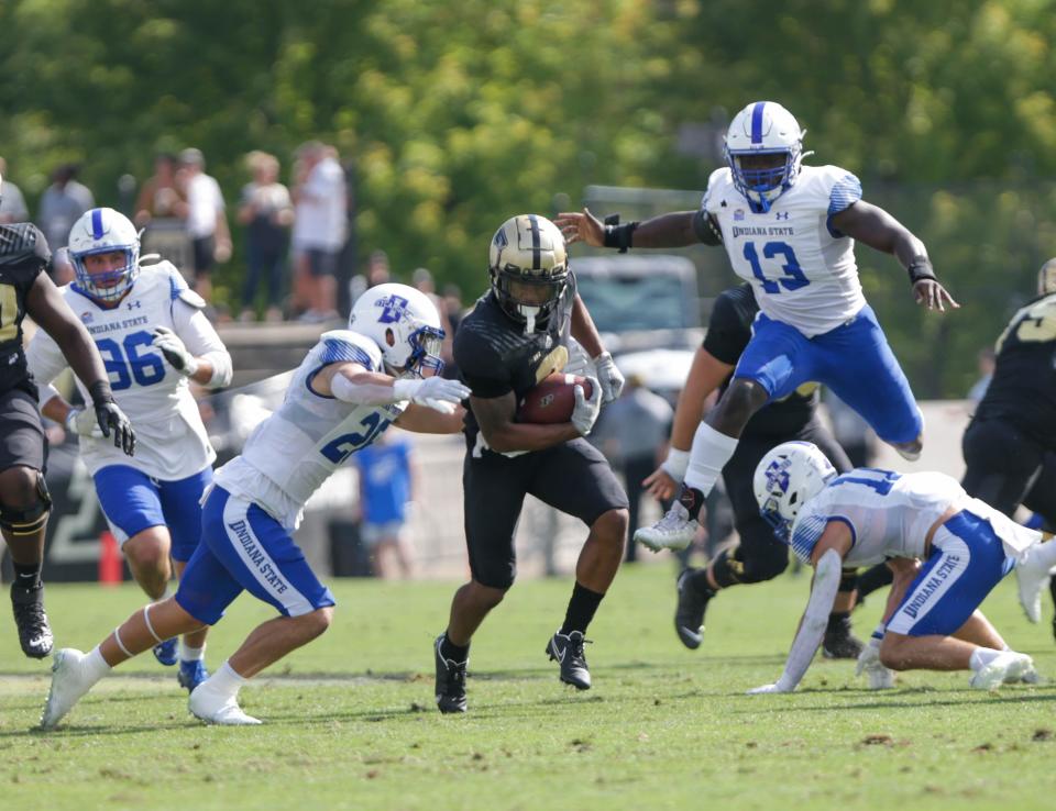 Purdue Boilermakers wide receiver Tyrone Tracy (3) avoids being tackled by Indiana State Sycamores defensive line during the NCAA football game, Saturday, Sept. 10, 2022, at Ross-Ade Stadium in West Lafayette, Ind.