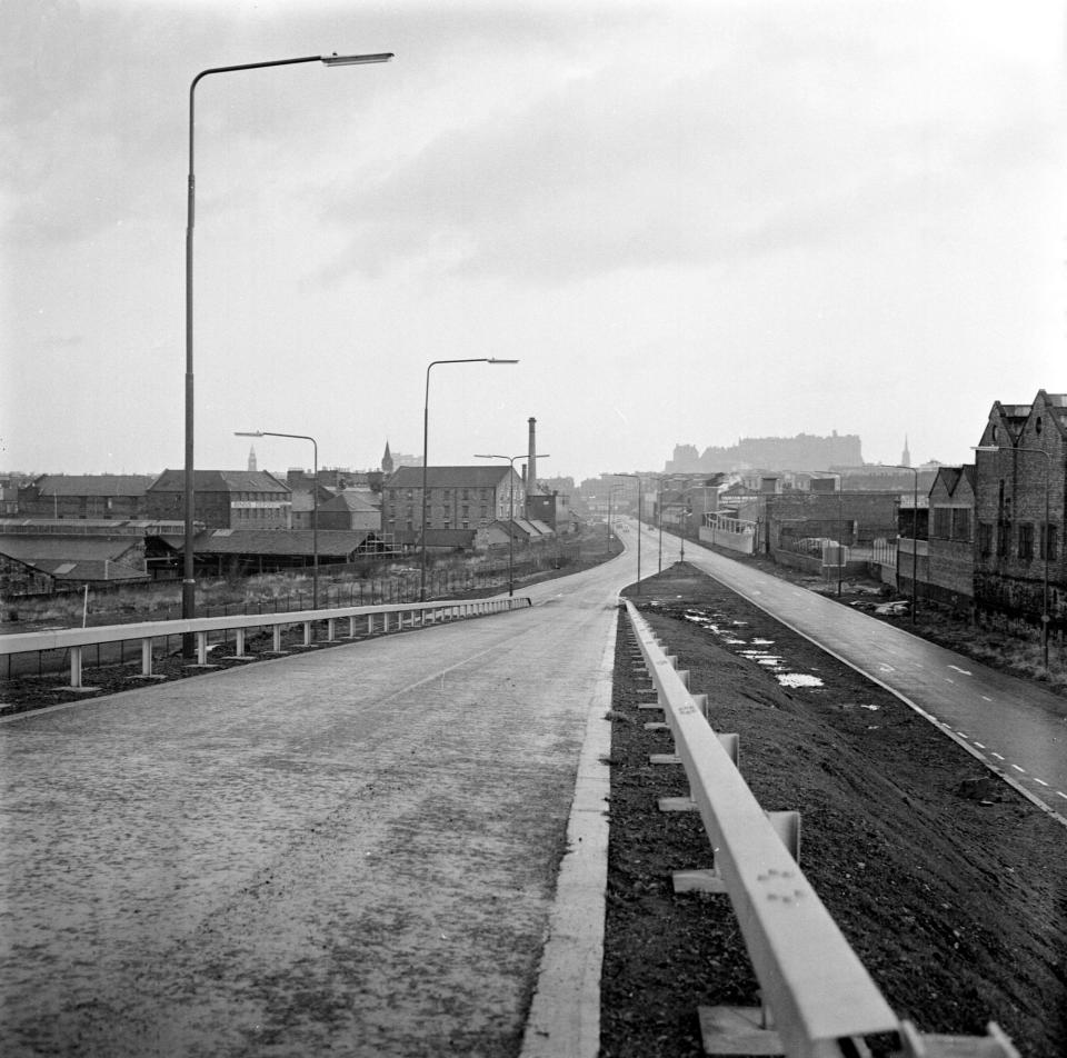 This is the West Approach Road - originally known as the West Link Road - which opened in December 1974. But there was a much more ambitious and controversial scheme, the Western Relief Road, which would have served as a bypass for Corstorphine, running from the end of the M8, through Broomhouse and Stenhouse to connect with the West Approach Road. It was supported by the Tory administration on Lothian Regional Council but in 1986 they lost power to Labour who were pledged to scrap it. Alistair Darling, who became Labour's transport convener, later recalled: 