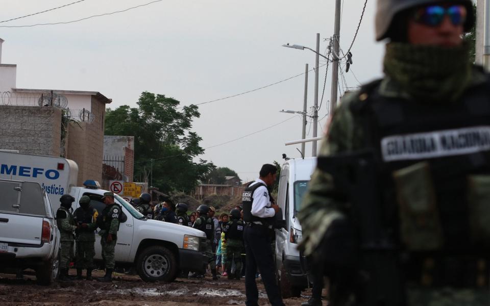 Members of the Mexican National Guard patrol the surroundings of a rehabilitation centre where an armed group killed at least 24 people, in Irapuato -  Str/EPA-EFE/Shutterstock/Shutterstock