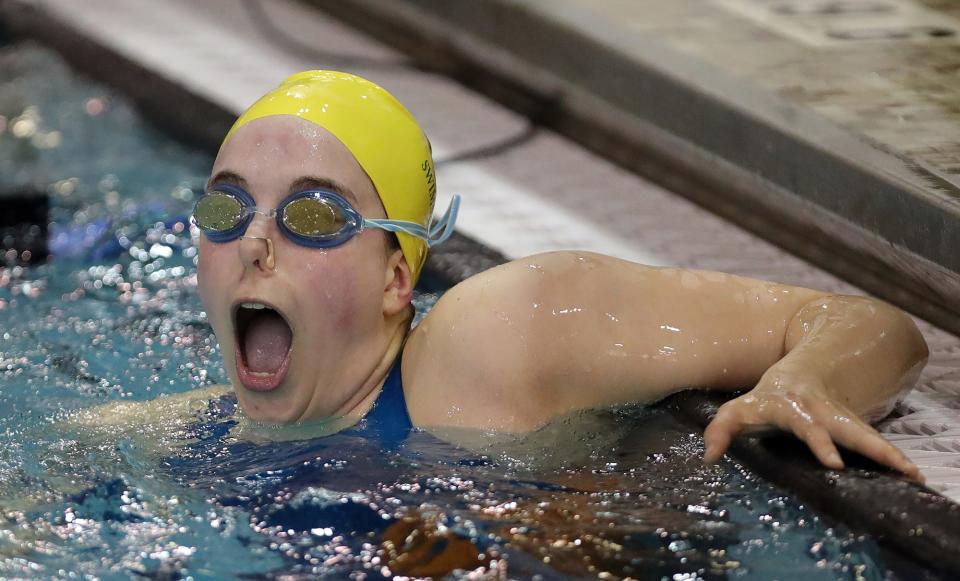 Firestone's Molly Rogers looks on in amazement after placing second in the girls 100 yard backstroke with a time of 54.12 seconds during the Division I State Swimming Championship at CT Branin Natatorium on Saturday.
