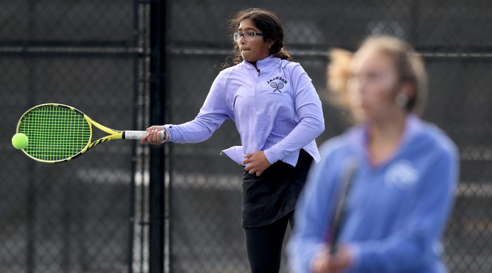 Jackson's Divya Shanmugam, shown, and Addyson Utterback compete against Hoover's Angelina Koinoglou and Claire Wood in OHSAA Northeast Ohio Girls D1 Sectional Tournament Doubles Semifinal at Jackson North Park.  Saturday, October 09, 2022.