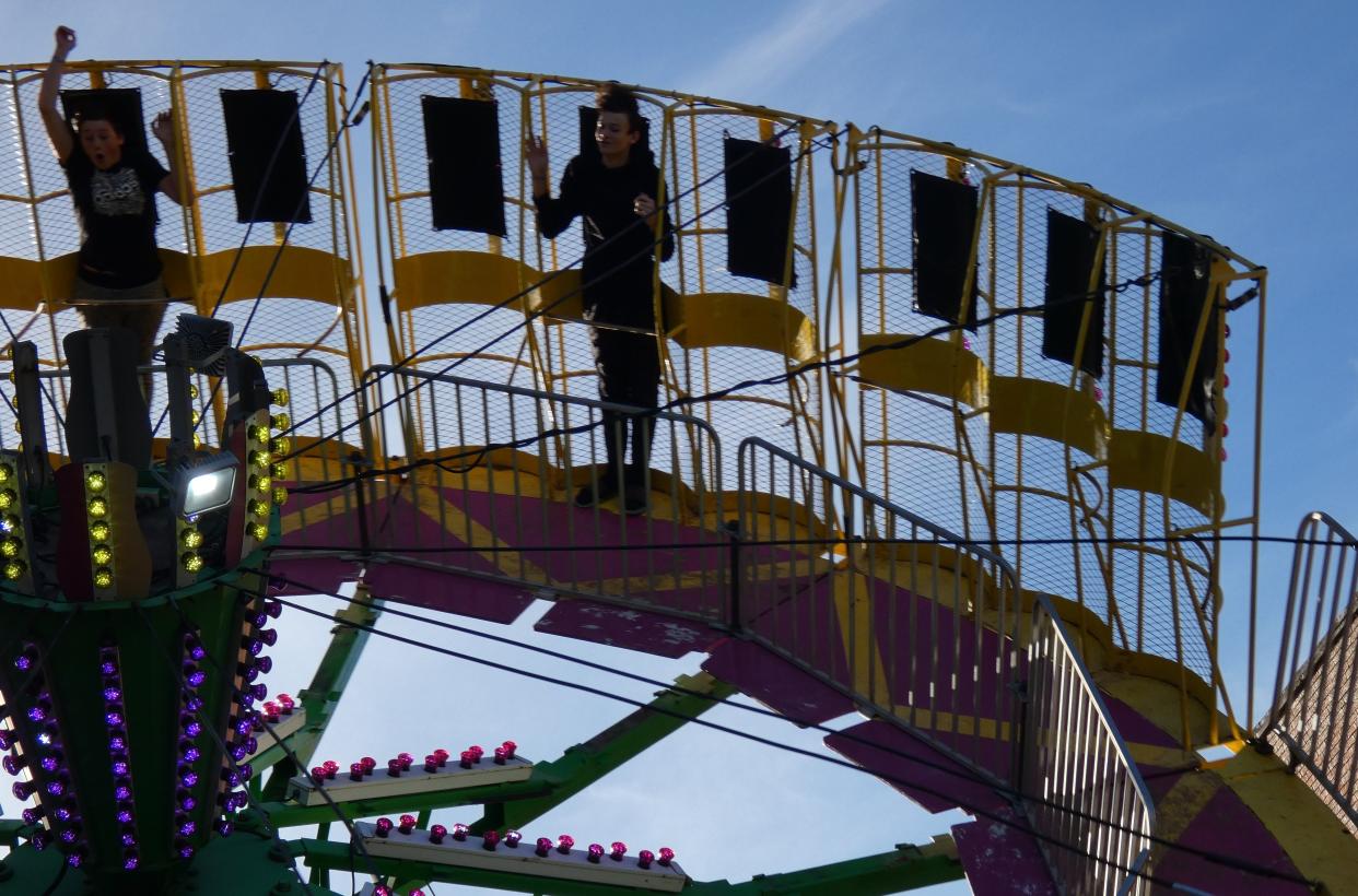 A ride spins festival-goers through the sky at the 2021 Galion Oktoberfest.