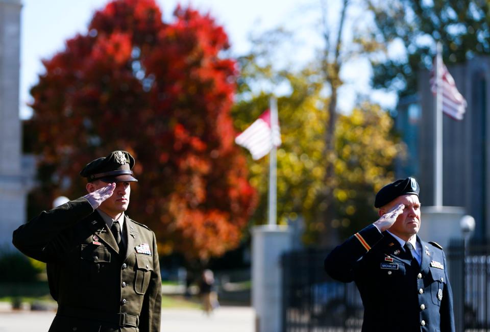 Veterans salute the flag as it is raised during a ceremony showing appreciation for veterans military service on Veterans Day at Missouri State University on Thursday, Nov. 11, 2021. 