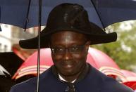 Swiss bank Credit Suisse's CEO Tidjane Thiam marches in a parade to mark the start of spring in Zurich, Switzerland April 18, 2016. REUTERS/Arnd Wiegmann/File Photo