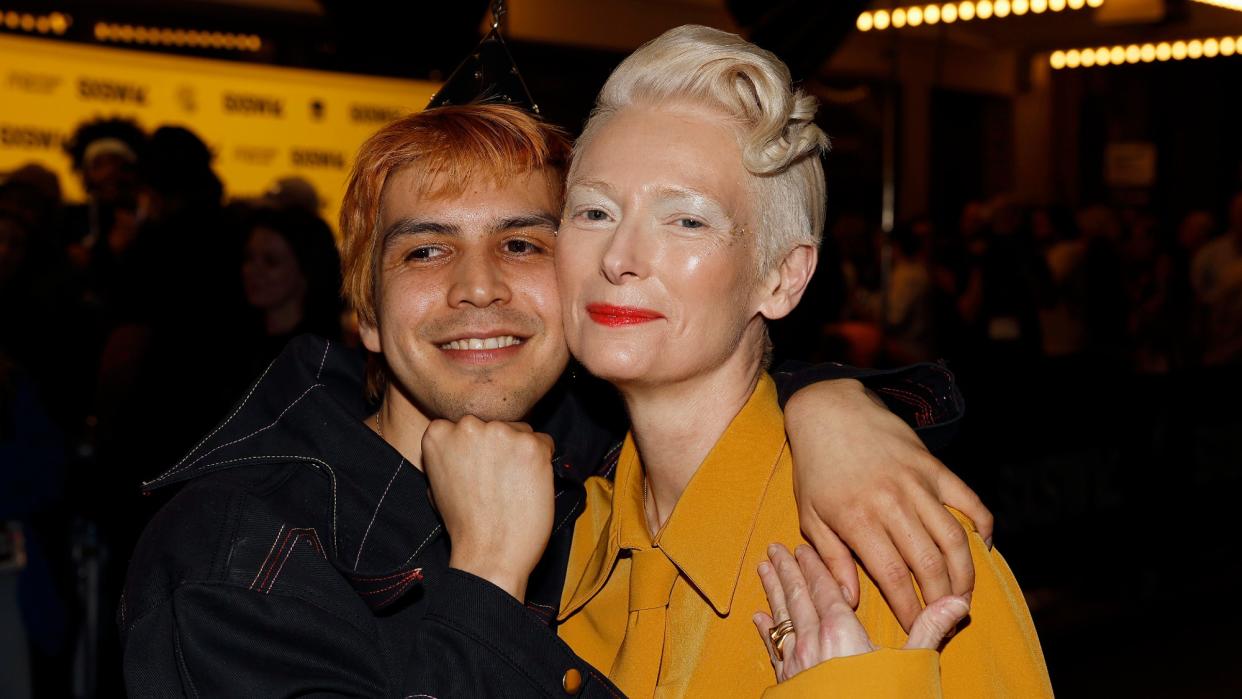  Julio Torres and Tilda Swinton embracing at the world premiere of Problemista. 
