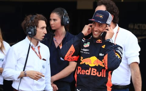 Daniel Ricciardo takes a phone call from a delighted Red Bull owner - Credit: getty images