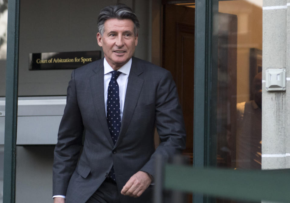 FILE - In this Monday, Feb. 18, 2019 file photo, International Association of Athletics Federations, IAAF, president Sebastian Coe leaves after a hearing of South Africa's two-time Olympic 800-meter champion runner Caster Semenya, in Lausanne, Switzerland. Semenya has accused IAAF president Sebastian Coe of opening “old wounds” in an interview in an Australian newspaper, where he said female athletes with high levels of naturally occurring testosterone were a threat to fairness in women’s sport. (Laurent Gillieron/Keystone via AP, File)