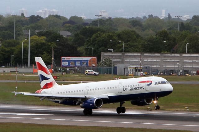 BA passenger rushed to hospital after bag falls on his head