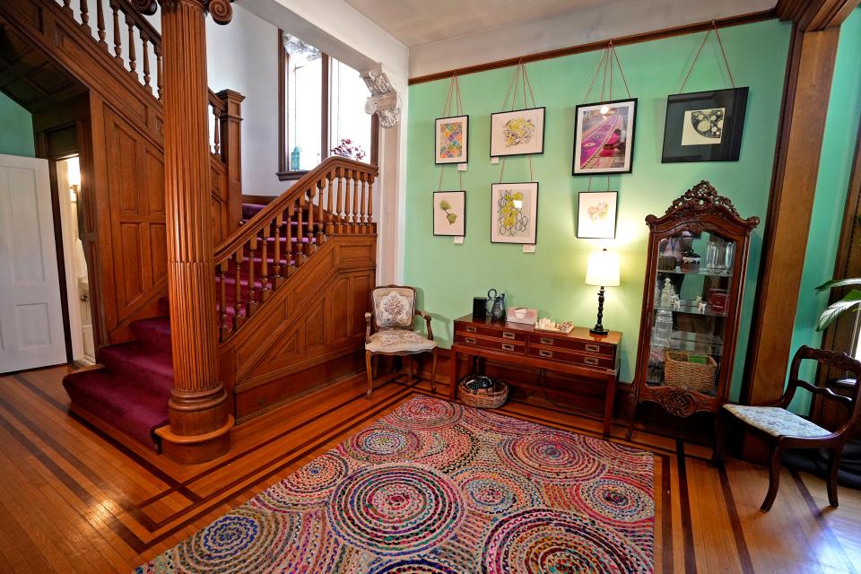 Rebekah Nicholas' artwork is seen in the foyer at her Concordia neighborhood home. The home will be part of the Historic Concordia Home Tour in Milwaukee.