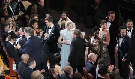 90th Academy Awards - Oscars Show - Hollywood, California, U.S., 04/03/2018 - Host Jimmy Kimmel (R) leads a group of luminaries out of the theater as part of the show. REUTERS/Lucas Jackson