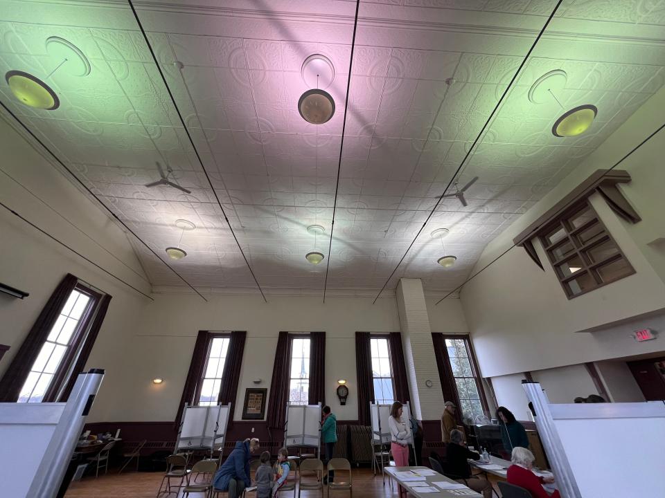 The Hinesburg Town Hall, a historic building dating back to 1901, was once again welcoming voters after being closed off for several years due to structural issues in the ceiling. Thin, black structural rods spanning the distance between the walls can be seen on March 5, 2024.