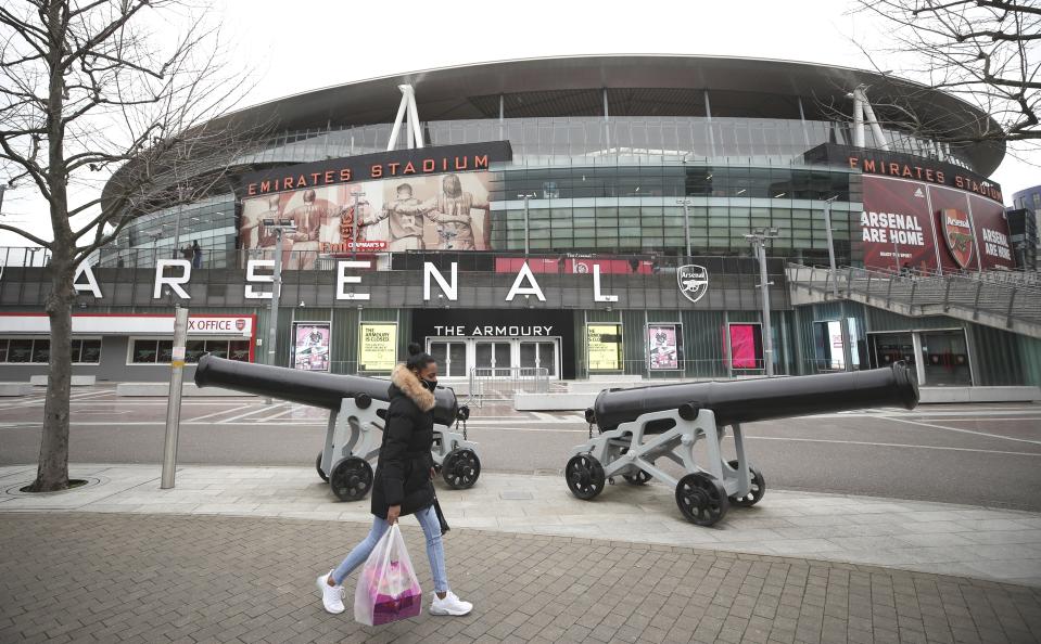 FILE - A general view outside the stadium before the English Premier League soccer match between Arsenal and Tottenham Hotspur at the Emirates stadium in London, England, Sunday, March 14, 2021. Arsenal has revealed new artwork that will be displayed on the exterior of the Emirates Stadium. ((Nick Potts/Pool via AP, File)