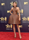 For the 2019 MTV Movie and TV Awards, the singer-turned-actress chose a structured August Getty leather dress. Really pushing the trend, Zendaya even completed the outfit with matching leather shoes. <em>[Photo: Getty]</em>