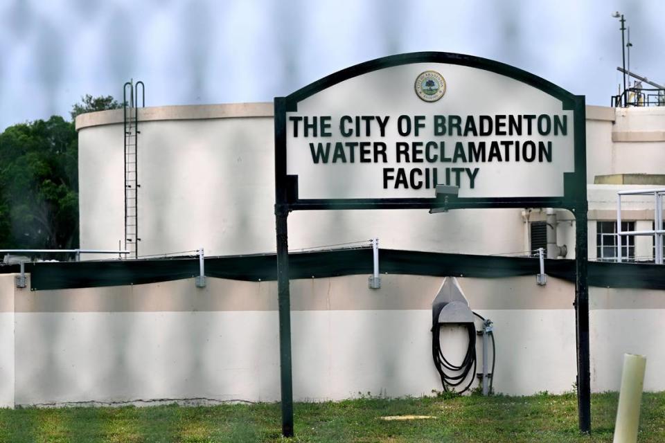 Through a chain-link fence, the sign for the City of Bradenton’s Water Reclamation Facility on March 26, 2024. Records say that a lack of staff and experience at the City of Bradenton’s wastewater treatment plant has led to numerous sewage spills in recent months, including a 1.2. million-gallon spill in February that polluted the Manatee River.