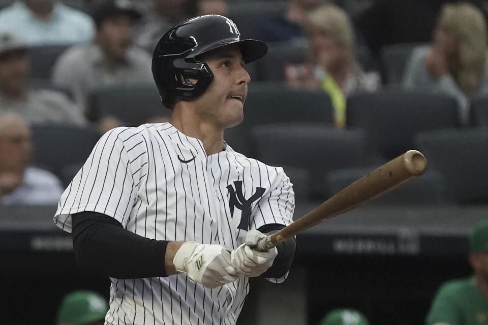 New York Yankees' Anthony Rizzo watches his home run during the first inning of a baseball game against the Oakland Athletics, Monday, June 27, 2022, in New York. (AP Photo/Bebeto Matthews)