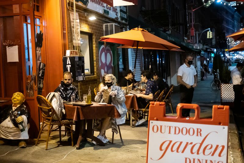 People enjoy outdoor dining amid the coronavirus disease (COVID-19) outbreak in Manhattan