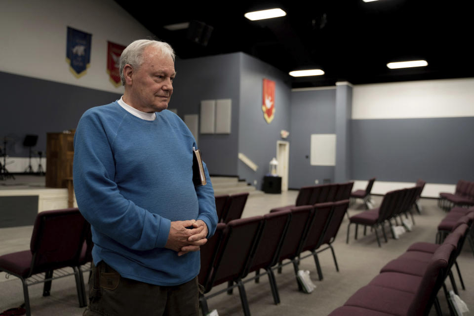 In this image provided by Religion News Service, Pastor Ron Smith poses at Church of the King in McAllen, Texas, on March 17, 2022. Nudism attracts unlikely allies. Some non-denominational, hard-line conservative clergy accept nudism. Pastor Smith vehemently opposes homosexuality, abortion and the transgender community, but when it comes to nudism, his strident views loosen up. (Jeremy Lindenfeld/Religion News Service via AP)