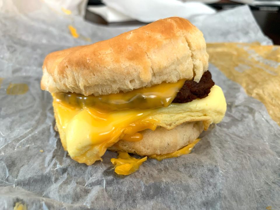 Burger King sausage, egg, and cheese biscuit on white wrapper