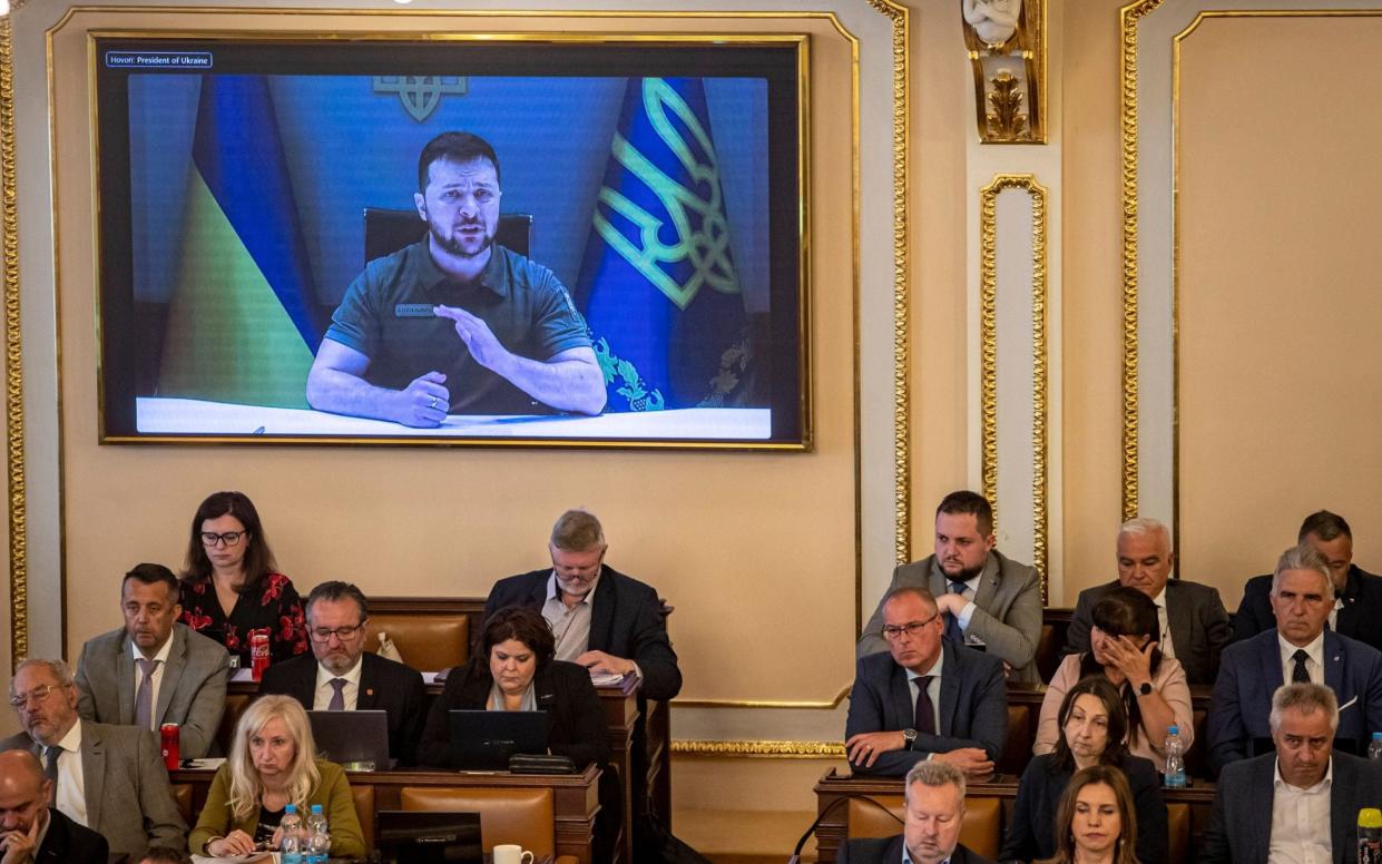 Volodymyr Zelensky speaking to the Czech parliament, where he demanded EU candidacy status for Ukraine - Martin Divisek/EPA-EFE/Shutterstock