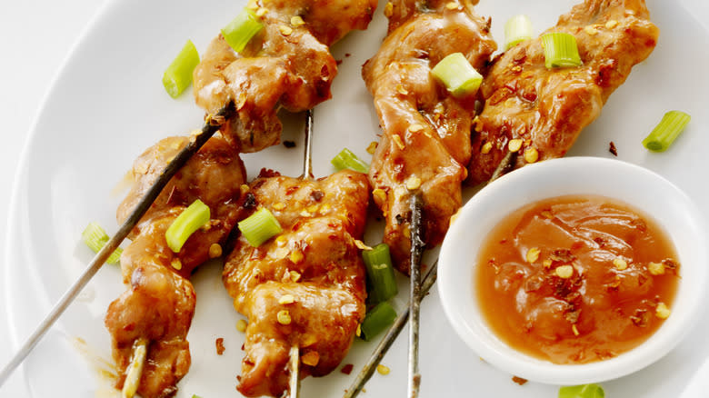 Pork skewers with dipping sauce