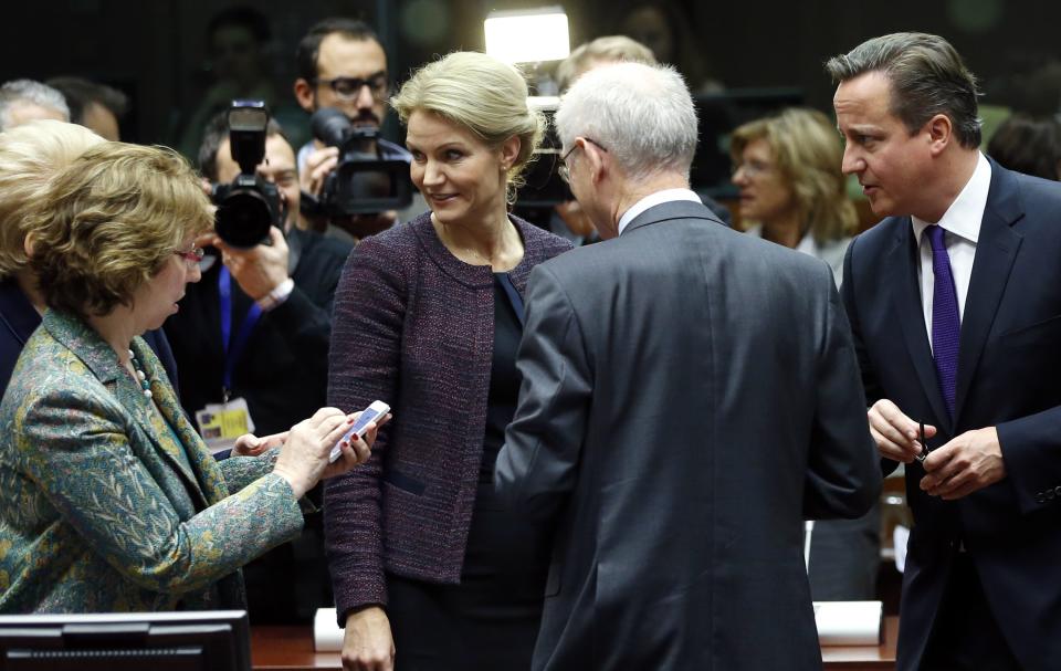 (From L to R) European Union foreign policy chief Catherine Ashton, Denmark's Prime Minister Helle Thorning Schmidt, European Council President Herman Van Rompuy and Britain's Prime Minister David Cameron attend a European Union leaders summit in Brussels October 25, 2013. German Chancellor Angela Merkel demanded on Thursday that the United States strike a "no-spying" agreement with Berlin and Paris by the end of the year, saying alleged espionage against two of Washington's closest EU allies had to be stopped. REUTERS/Francois Lenoir (BELGIUM - Tags: POLITICS)