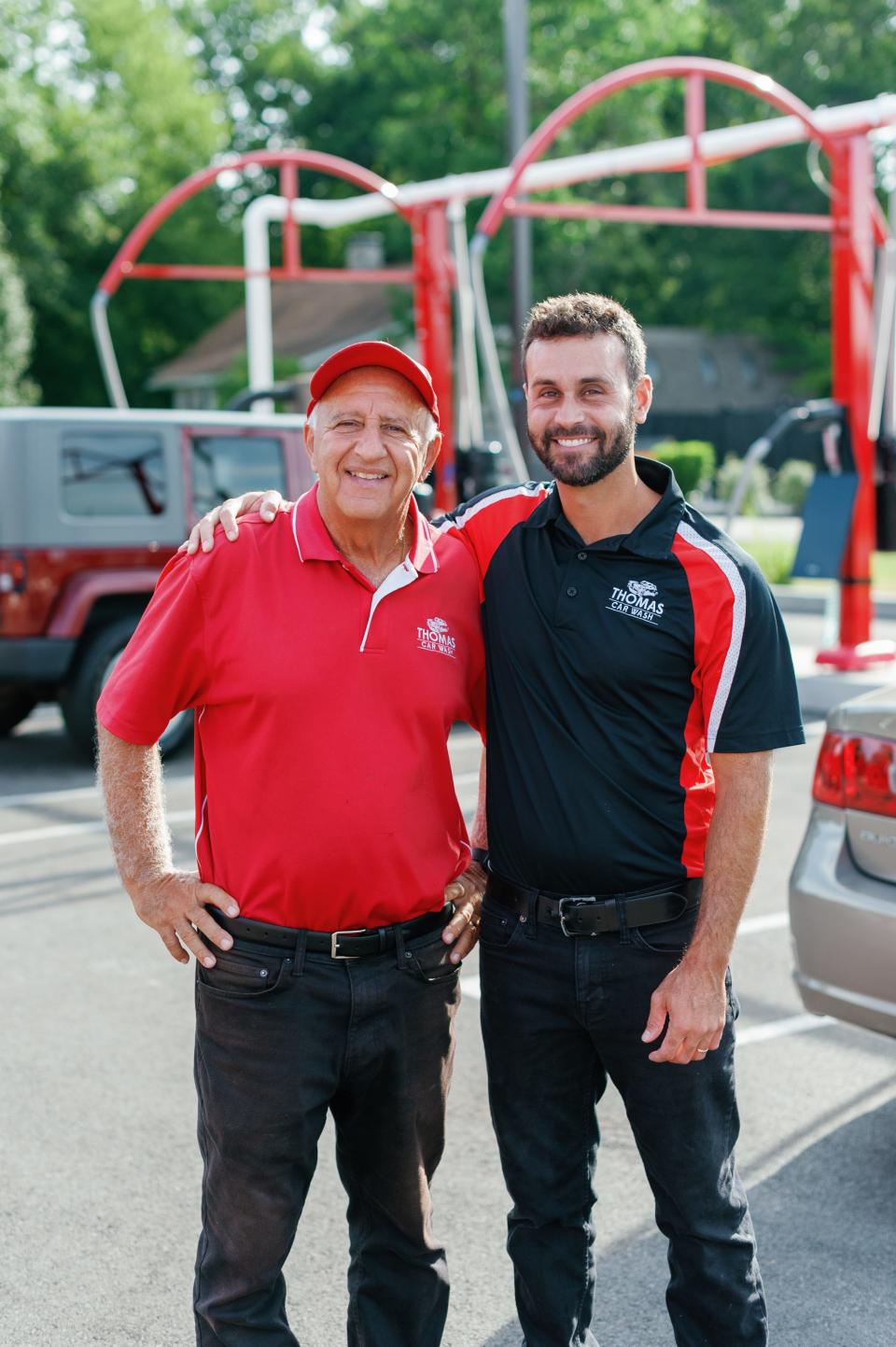 Alex Thomas, the owner of Thomas Car Wash poses with his father Eli Thomas. The car wash has been in the Thomas family for over 75 years.