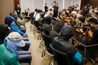 Family members of twelve Hong Kong activists hold a news conference to seek help in Hong Kong