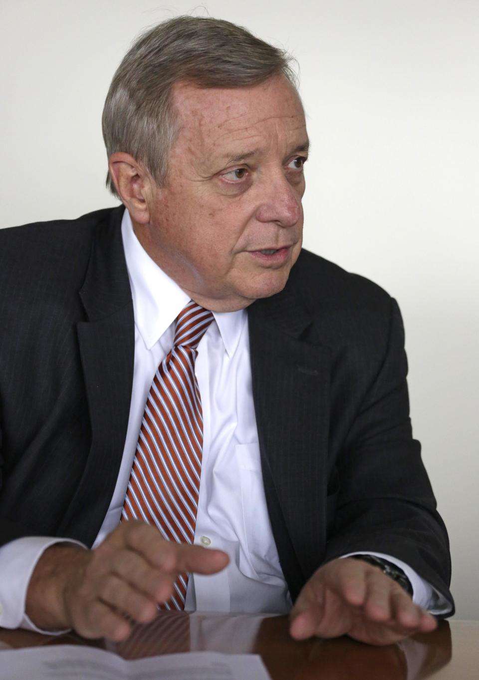 “Under Attorney General Holder’s leadership, the Justice Department has demonstrated that our criminal justice system is our most powerful tool for combatting terrorism, collecting important intelligence and incapacitating terrorists while respecting the rule of law," Durbin said in a statement on Thursday. (AP Photo/M. Spencer Green)