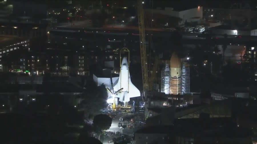 Space shuttle Endeavour being hoist into launch position