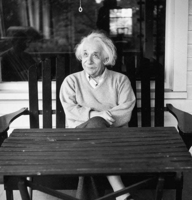 Photo of Albert Einstein on his porch at home in Princeton, New Jersey.